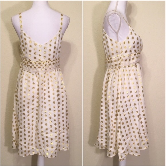 white dress with gold polka dots